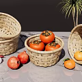 Fresh Assorted Fruits in Wicker Baskets on Gray Countertop Including Persimmons Pomegranates and Tangerines