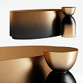 Elegant Modern Round Dining Table With Golden Metallic Surface And Decorative Bowls