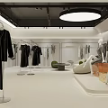 Modern Clothing Store Interior With Mannequins Clothing Racks Sofa And Large Poster