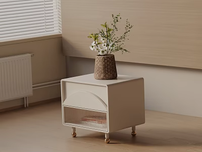 Modern Light Colored Nightstand With Curved Drawer Mesh Storage Gold Wheels And Potted Plant 3d model
