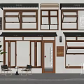 Coffee Shop Storefront Design Featuring Glass Windows Wooden Frames Awnings And Outdoor Seating