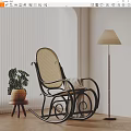 Rattan Leisure Chair with Blanket and Potted Plant Near Floor Lamp in Modern Interior