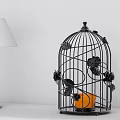 Black Metal Birdcage Ornament Set With Floral Decor Orange Candle And Table Lamp