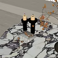 Decorative Ornament Set With White Candle Holders Lit Candles Nuts On Books And Dried Flowers
