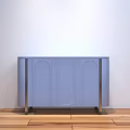Light Purple Side Cabinet With Curved Door Panels And Metal Legs Against White Wall