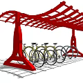 Red Bike Shelter Structure With Curved Metal Frame And Parked Bicycles