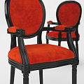 Elegant classic style armchairs with red velvet upholstered seats and black wooden frames