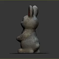 Cute Rabbit Sculpture Holding Orange Carrot And Standing On Round Base