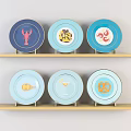 Colorful Decorative Plates With Various Patterns On Wooden Shelves