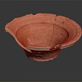 Vintage Handcrafted Orange Terracotta Bowl With Cracked Surface And Textured Edge