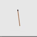 Single Unlit Wooden Matchstick With Black Tip Isolated On White Background