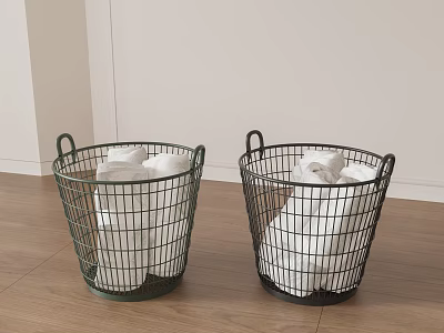 Two Metal Wire Baskets With White Linens On Wooden Floor 3d model