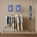 Clothing Display Rack With Hanging Apparel Blue Patterned Fabrics And Decorative Shoes
