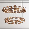 Modern Circular Copper Chandeliers With Decorative Leaf Design Hanging In Interior Room 3d model