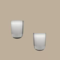Modern Minimalist Wall Sconces With Cylindrical Design And Soft Lighting On Light Colored Wall 3d model