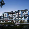 Modern Townhouse Exterior with Multi Storey Design Landscaped Gardens and Evening Lighting