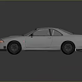 Silver Sleek Sports Car With Rear Spoiler And Sporty Alloy Wheels