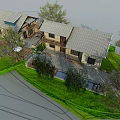 Traditional Guesthouse Building With Wooden Walkway Stone Pavement And Outdoor Seating