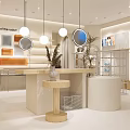 Modern Stylish Boutique Interior With Metal Display Racks Round Counter Pendant Lights And Green Plants