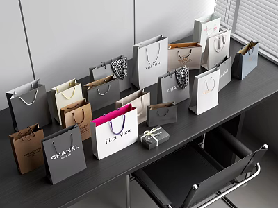 Different Brand Shopping Bags And Small Gift Box Decorative Set Arranged On Black Office Desk 3d model
