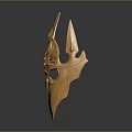 Ornate Golden Decorative Mask With Spiked Top And Intricate Central Design