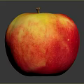 Fresh Ripe Red and Yellow Apple with Shiny Skin on Dark Background