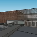 Modern Brown Museum Building With Perforated Facade Water Reflection And Blue Sky White Clouds
