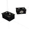 Two Black Decorative Boxes With Golden Accents And Metal Clasps