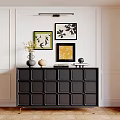 Black Decorative Cabinet with Top Ornaments and Modern Wall Art in White Minimalist Interior