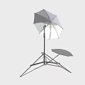 Photography Lighting Equipment Setup With Umbrella Softbox And Reflector On Tripod Stand