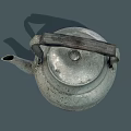 Old Metal Kettle with Worn Finish as Classic Daily Living Product