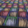 Colorful LED Light Square Panels On Floor Arranged In Grid With Illuminated Patterns