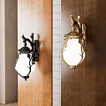 Black and Gold Metal Frame Chandeliers with Glass Shades on Interior Wooden and Striped Walls