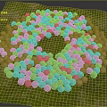 Many Baseballs in Circular Arrangement on Green Grass as Sports Equipment