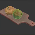 Gray Wooden Cutting Board With Two Fresh Ripe Pomegranates On Top