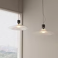 Two Modern Pendant Lights With White Shades Black Bases And Window Blinds