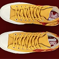 Yellow High Top Canvas Shoes With Red Logo And White Sole Design