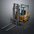 Yellow Industrial Forklift With Long Metal Forks And Driver Cabin