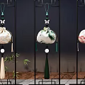 Decorative Ornament Decor Set with Three Black Stands Hanging Ornaments Colorful Tassels and Bamboo Backdrop