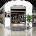 Elegant Clothing Store Interior With Fashion Displays Clothing Racks And Green Plant