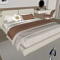 Modern Beige Upholstered Double Bed With White Brown Pillows Soft Blanket And Bedroom Rug