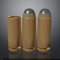 Three Copper Bullet Casings With Silver Tips Arranged In Reflective