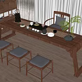 Traditional Wooden Tea Table and Chairs With Tea Set Potted Plant and Cushioned Seats