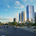 Road Infrastructure in Urban Environment With High Rise Buildings Greenery and Vehicles