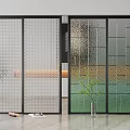 Sleek Black Frame Sliding Doors with Perforated and Textured Glass Panels