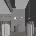 Modern Material Showroom With Various Color Samples On Walls And Central Display Counter