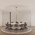 Modern Round White Conference Table With Eight Gray Office Chairs And Green Plant