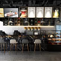 Warm Café Interior Design With Bookshelves Green Plants And Wooden Furniture