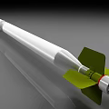 White Missile With Silver Nose Cone Blue Tail Section And Green Fins