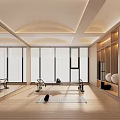 Indoor Sports Fitness Space Featuring Large Windows Wooden Floors Mirror Walls Exercise Bikes Yoga Mat